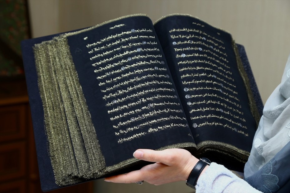 Muslim Woman spent 3 yrs hand-painting "Quran" on transparent silk pages.