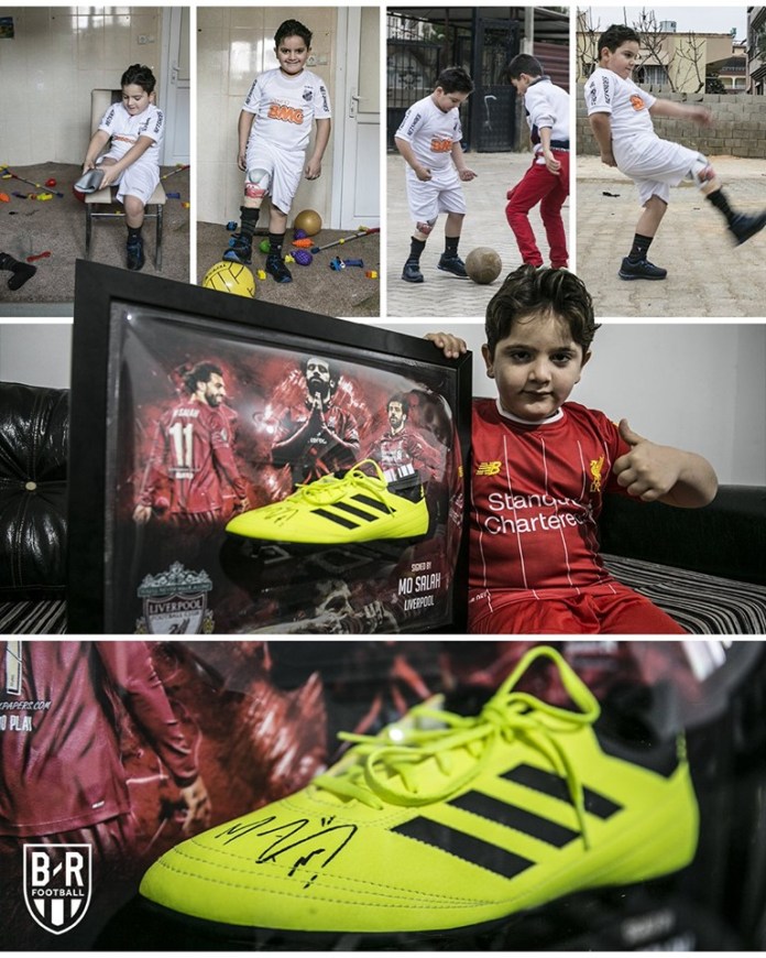 Mo Salah gives his shoes to a child who lost his leg in the Syria bombings.