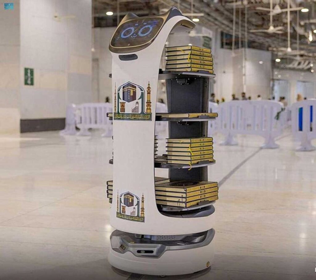 Robots distribute copies of the Quran to Hajj pilgrims.