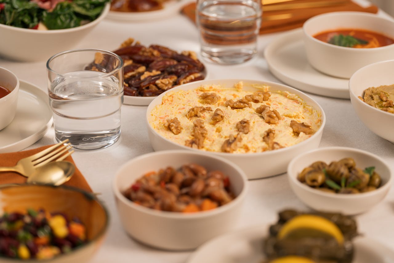 Traditional iftar table laid with dates, water, and dishes for breaking the Ramadan fast